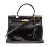 An Hermes 35cm Black Leather Kelly Bag, 14 x 8 x 7 inches.