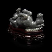 A Small Set of Eight Grey Jadeite Figures of Horses