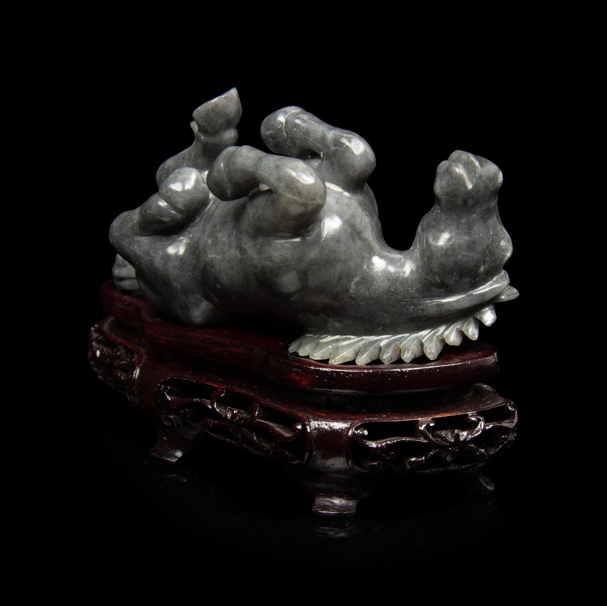 A Small Set of Eight Grey Jadeite Figures of Horses