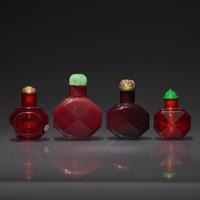 Four Chinese Facetted Ruby Glass Snuff Bottles, 18th Century or Later — 清中期及以後 寶石紅料八方磨棱鼻煙壺四支