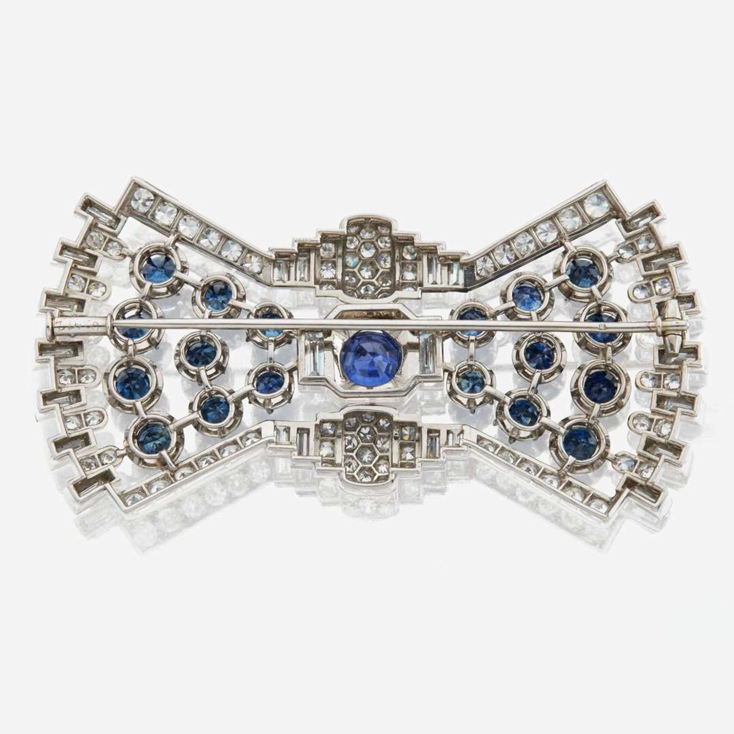 A diamond, sapphire, and platinum brooch