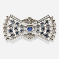 A diamond, sapphire, and platinum brooch