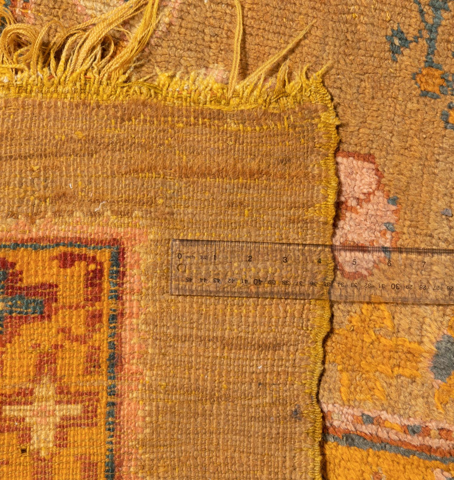An Oushak Wool Rug