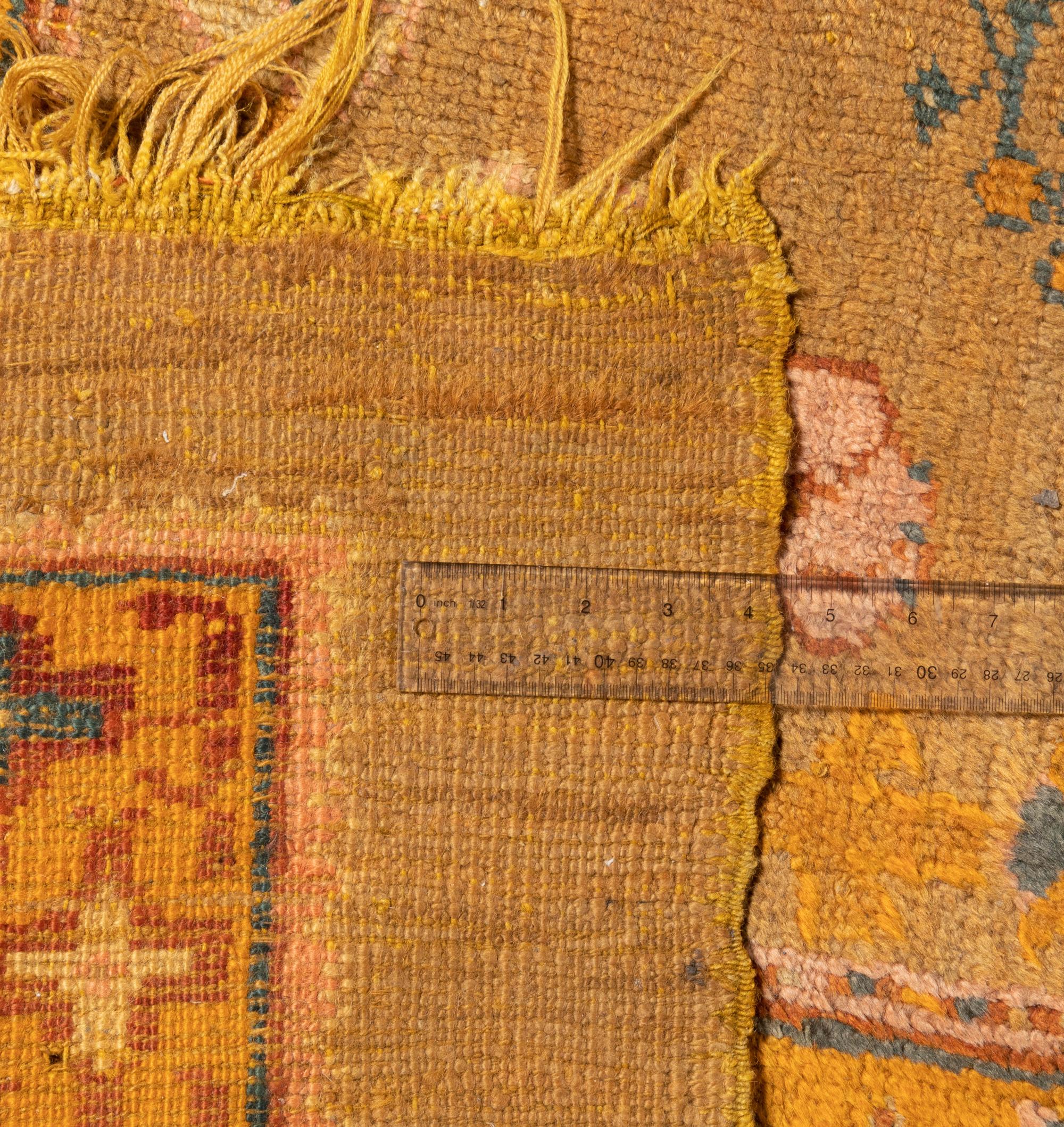 An Oushak Wool Rug