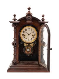 A Victorian Walnut Mantel Clock