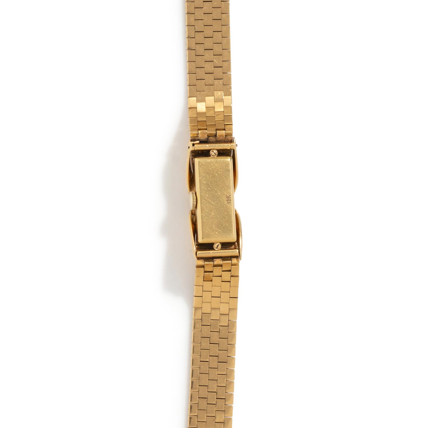 GÜBELIN, 18K YELLOW GOLD SURPRISE WATCH