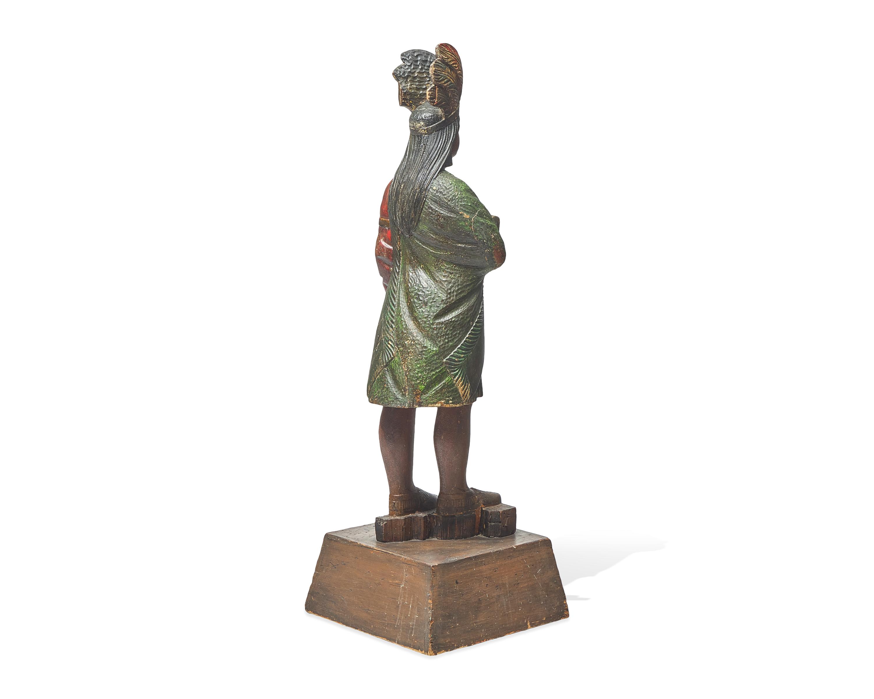 A Carved And Painted Tobacconist Figure Of A Native American Chief