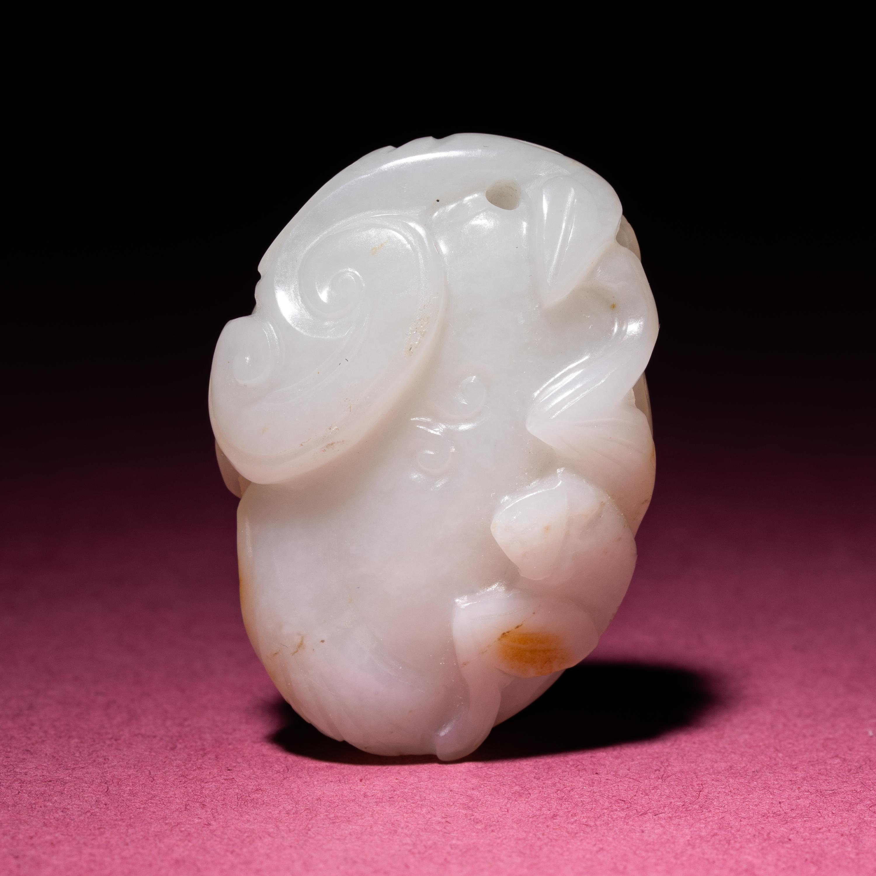 A Small Chinese Russet and Jade 'Bat and Lingzhi' Carving, 18th/19th Century — 清中期 白玉留皮靈芝福壽佩