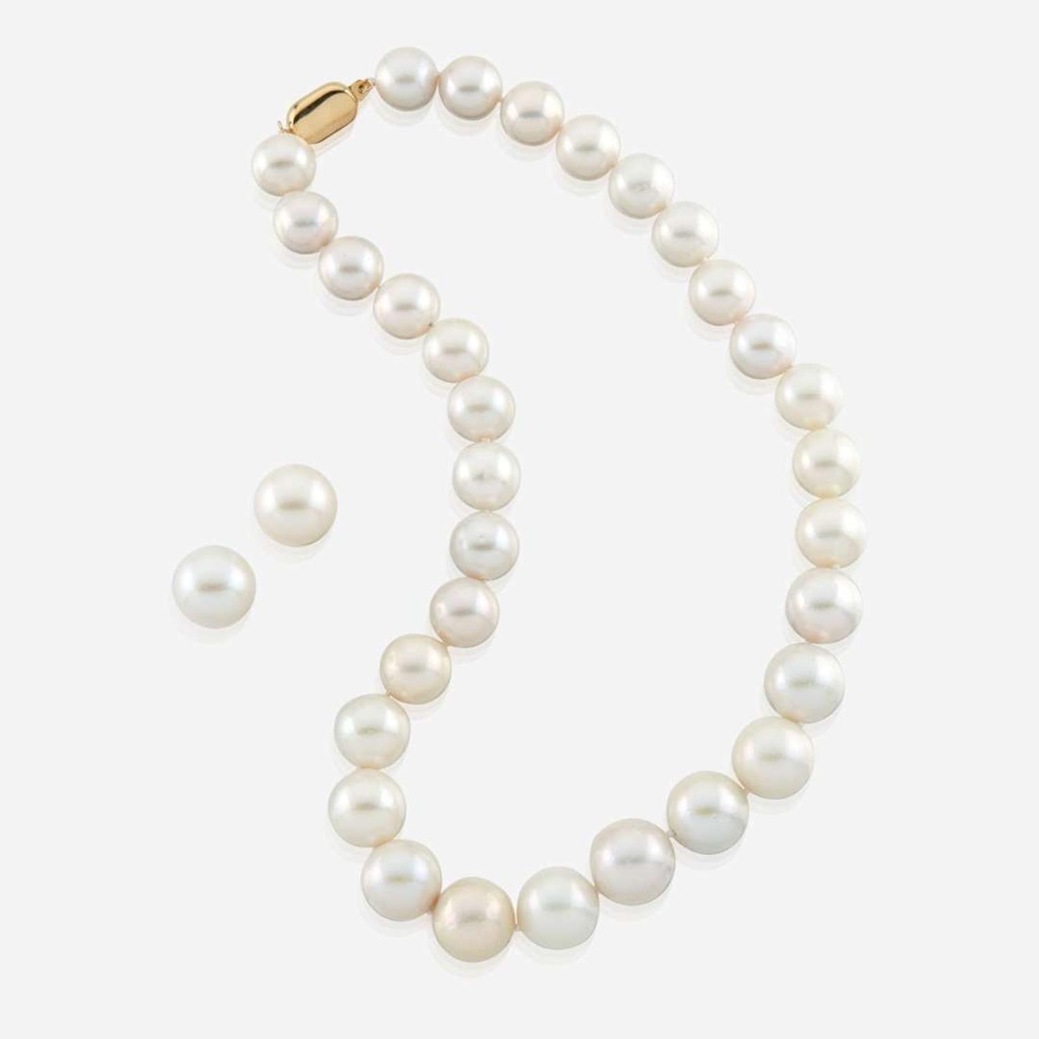 A South Sea cultured pearl and gold necklace with matching earrings