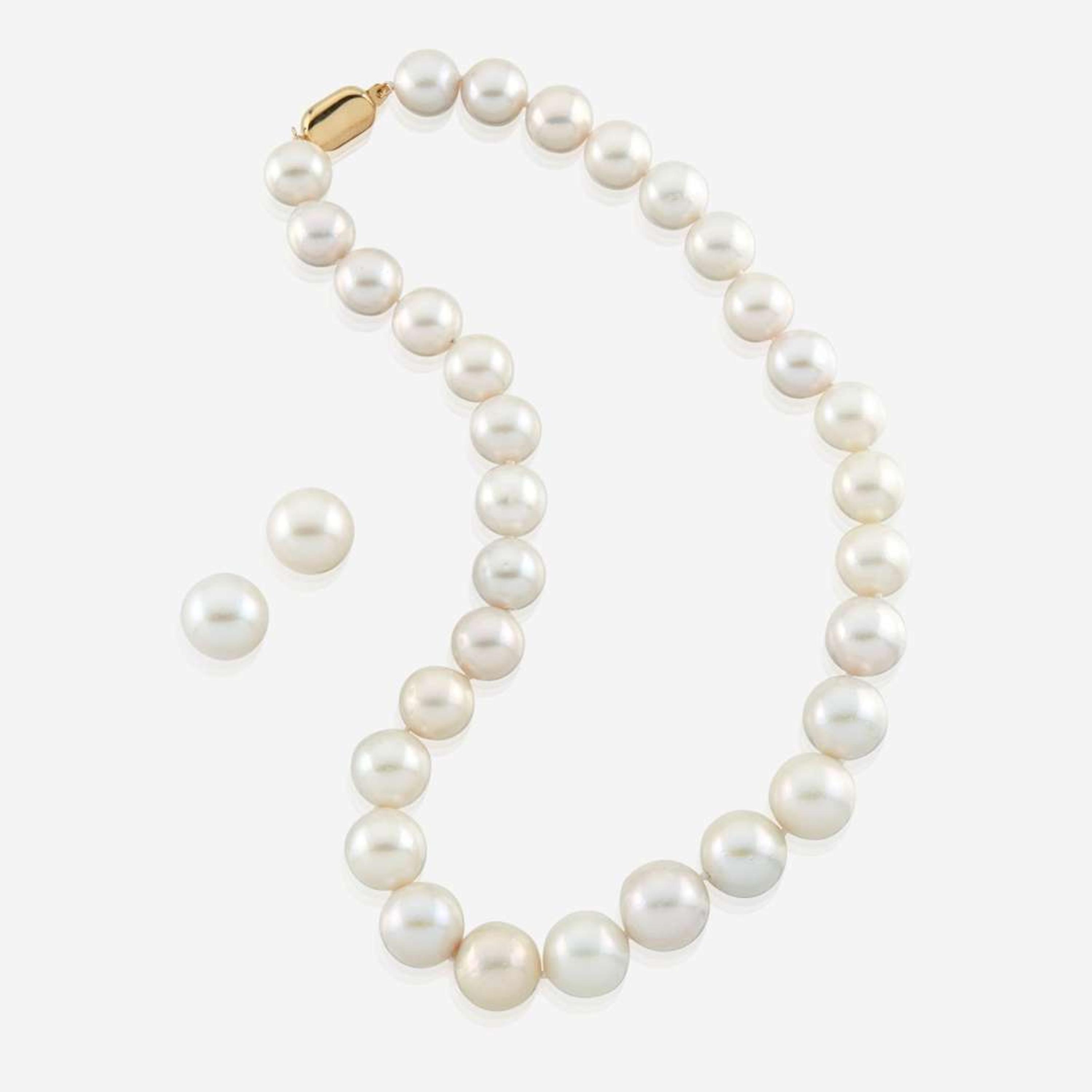 A South Sea cultured pearl and gold necklace with matching earrings
