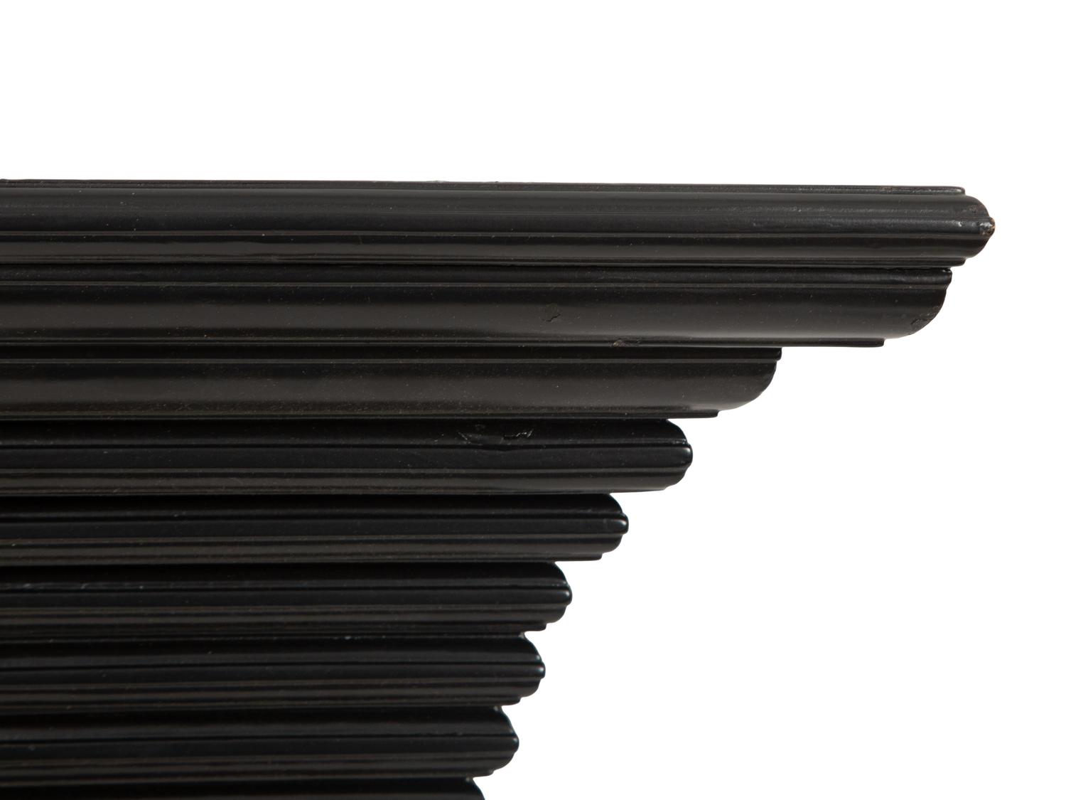 A Pair of Ebonized Wall Brackets
