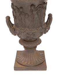 A Pair of Victorian Relief Decorated Cast Iron Garden Urns