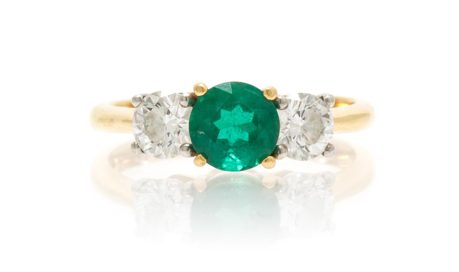 A Platinum, 18 Karat Yellow Gold, Emerald and Diamond Ring, Tiffany & Co., 3.50 dwts.
