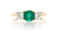 A Platinum, 18 Karat Yellow Gold, Emerald and Diamond Ring, Tiffany & Co., 3.50 dwts.