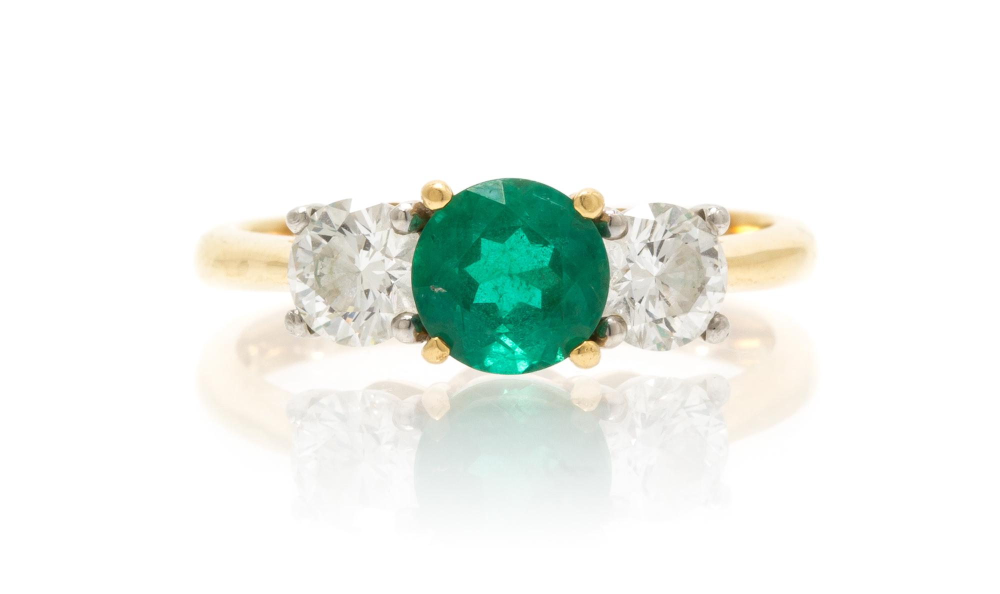 A Platinum, 18 Karat Yellow Gold, Emerald and Diamond Ring, Tiffany & Co., 3.50 dwts.