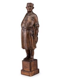 A German Carved Wood Figure of a Duck Hunter