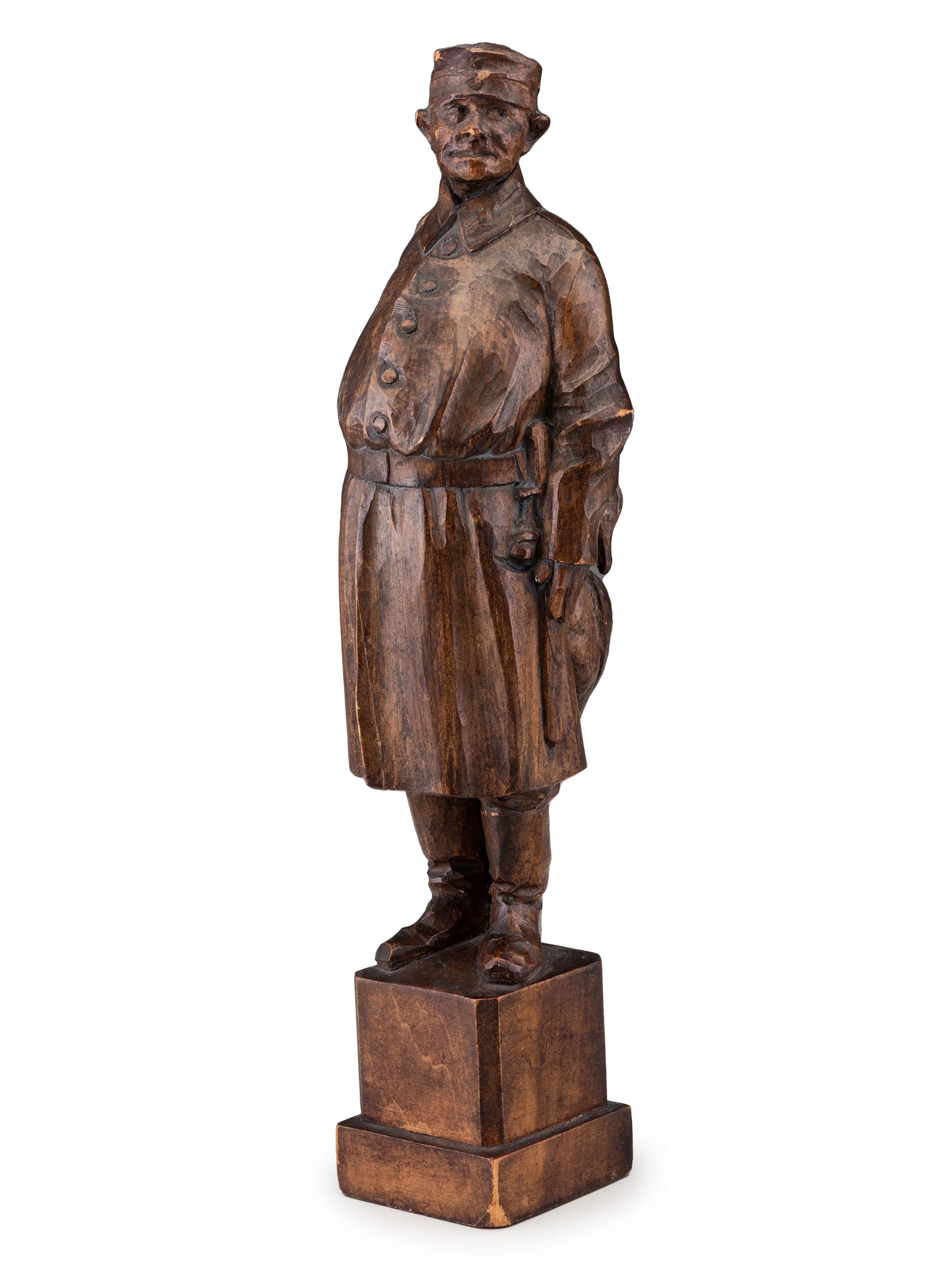 A German Carved Wood Figure of a Duck Hunter