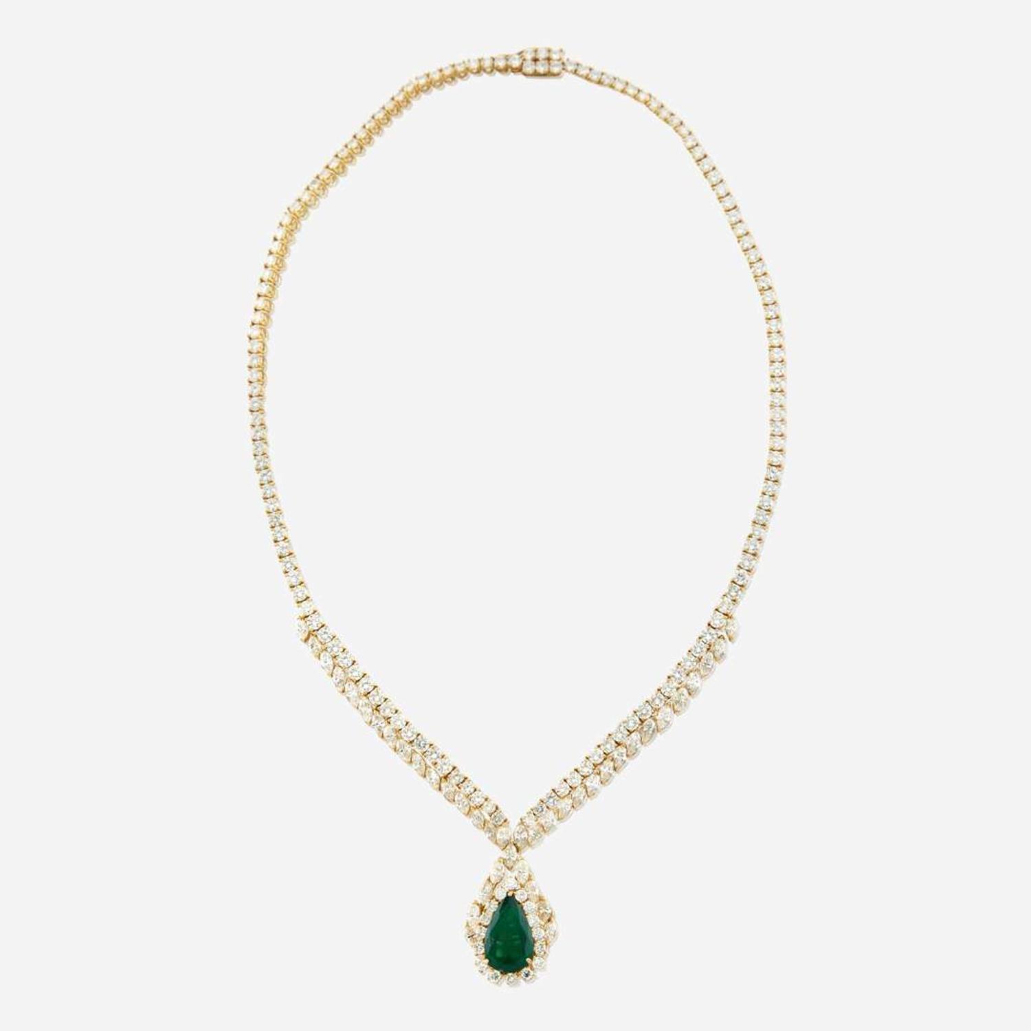 An emerald, diamond, and gold necklace