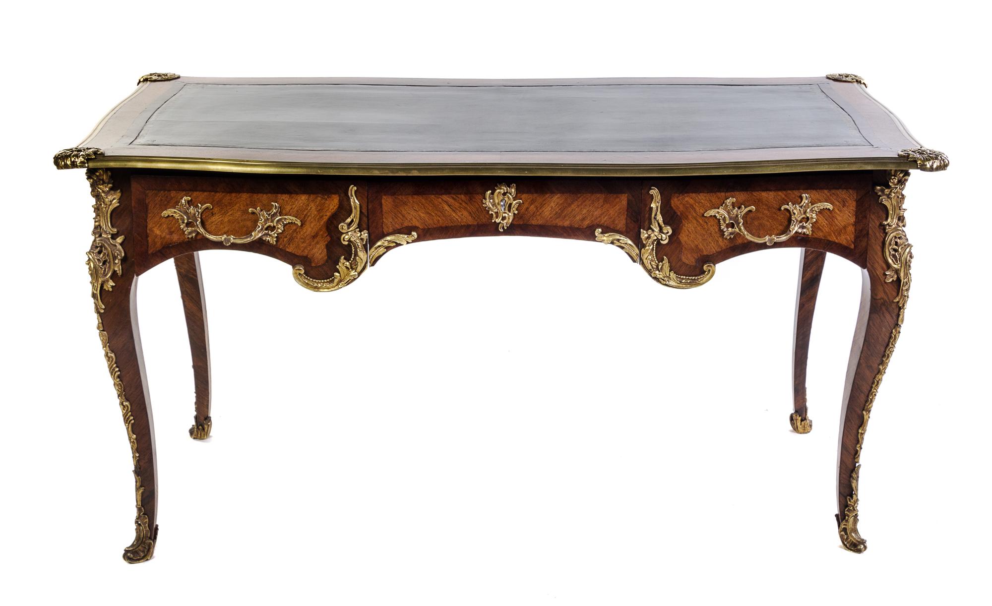 A Louis XV Style Gilt Bronze Mounted Fruitwood Bureau Plat Height 30 1/2 x width 59 x depth 30 3/4 inches. — LATE 19TH CENTURY