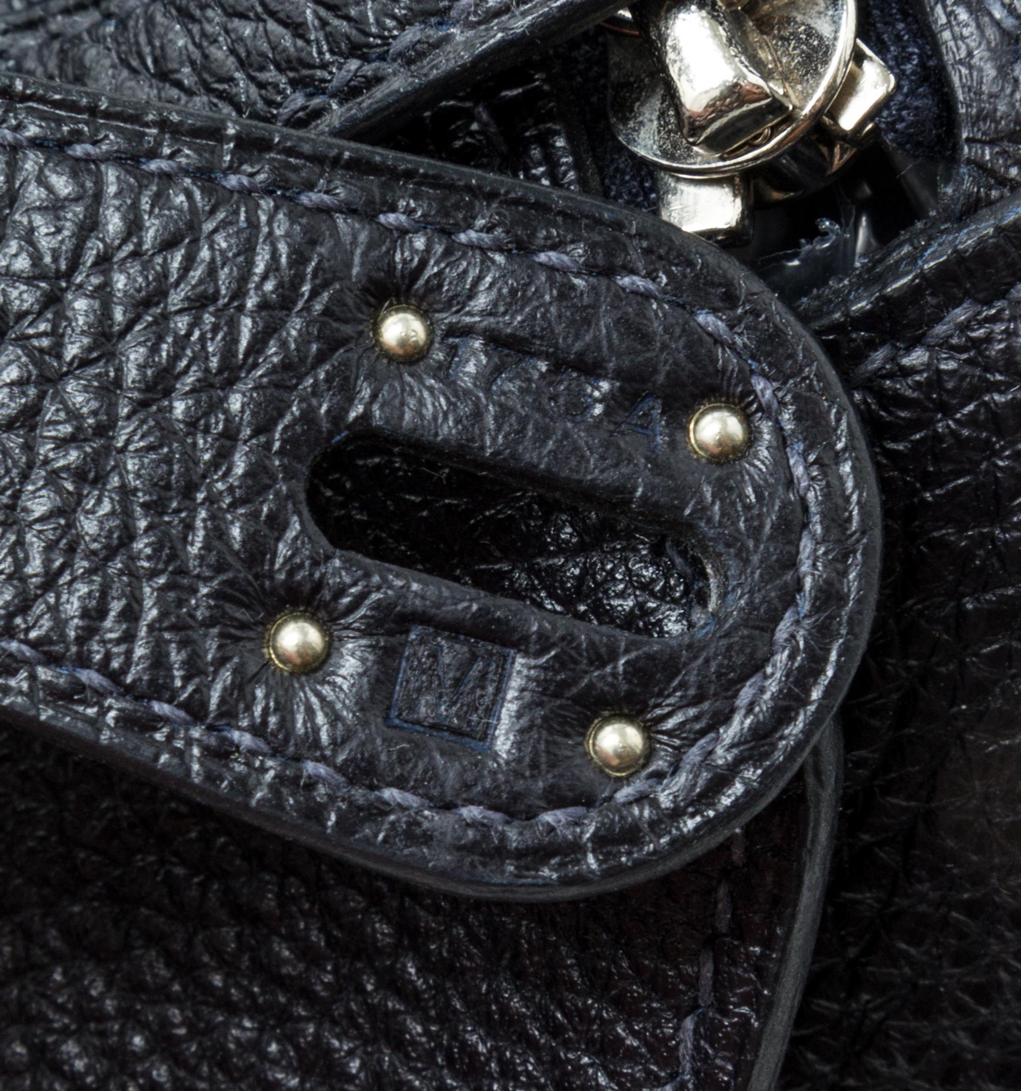 An Hermes Graphite Taurillon Clemence Lindy 34 Handbag, 13.5" x 8" x 7".