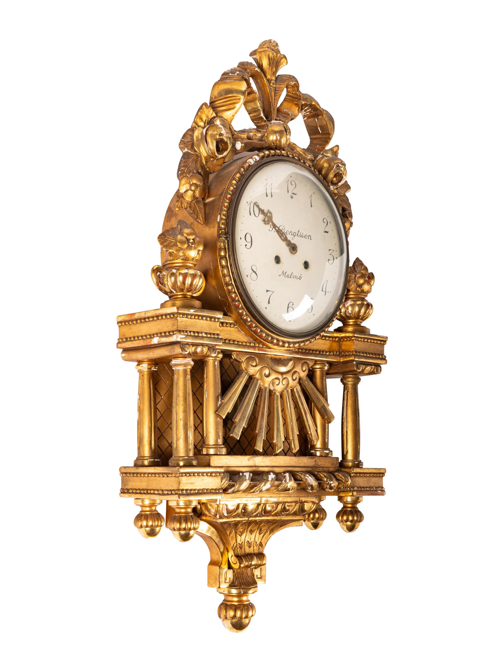 A Gustavian Style Giltwood Wall Clock