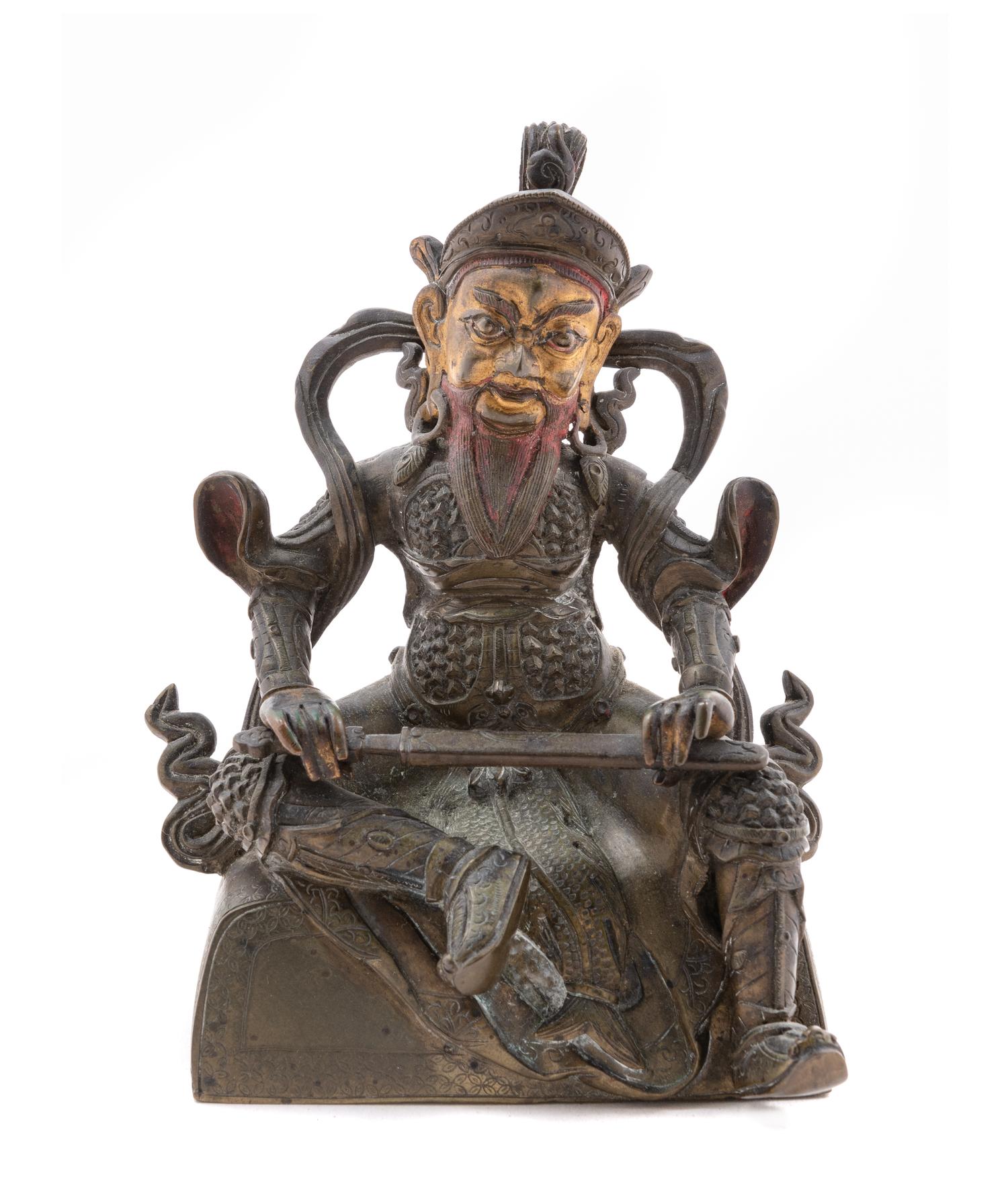 A Sino-Tibetan Parcel-Gilt Bronze Figure of Virudhaka