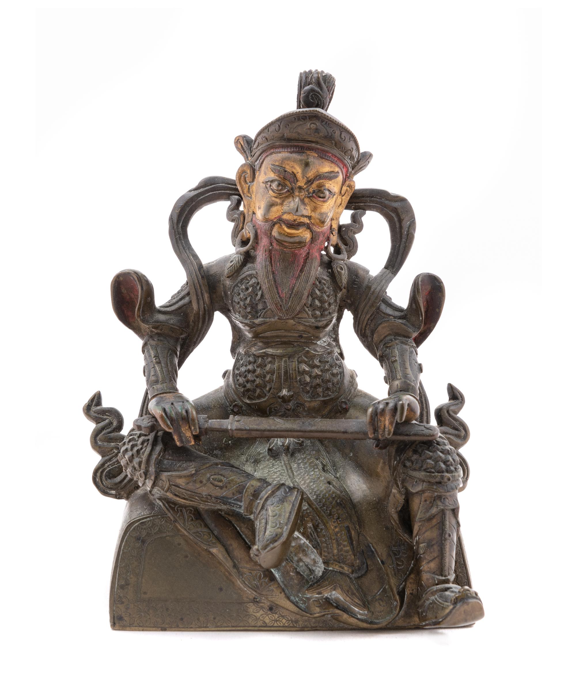 A Sino-Tibetan Parcel-Gilt Bronze Figure of Virudhaka