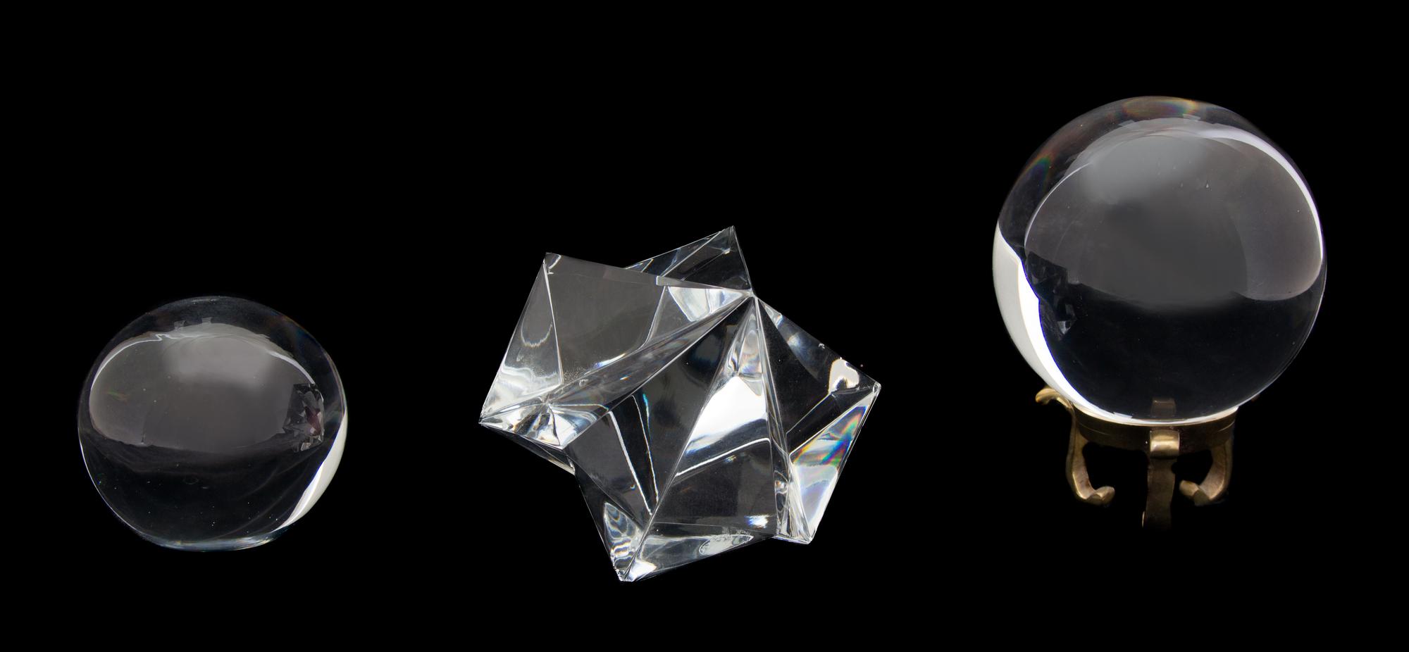 Three Crystal Paperweights Height of largest 5 inches. — 20TH CENTURY