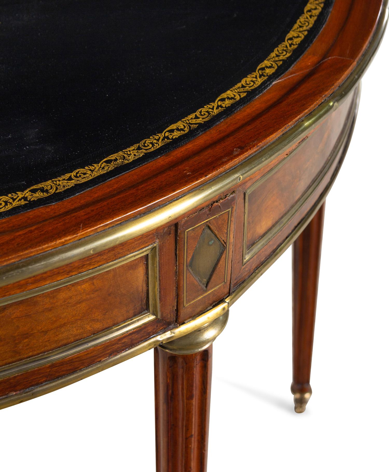 A Louis XVI Gilt Metal Mounted Mahogany Flip-Top Table