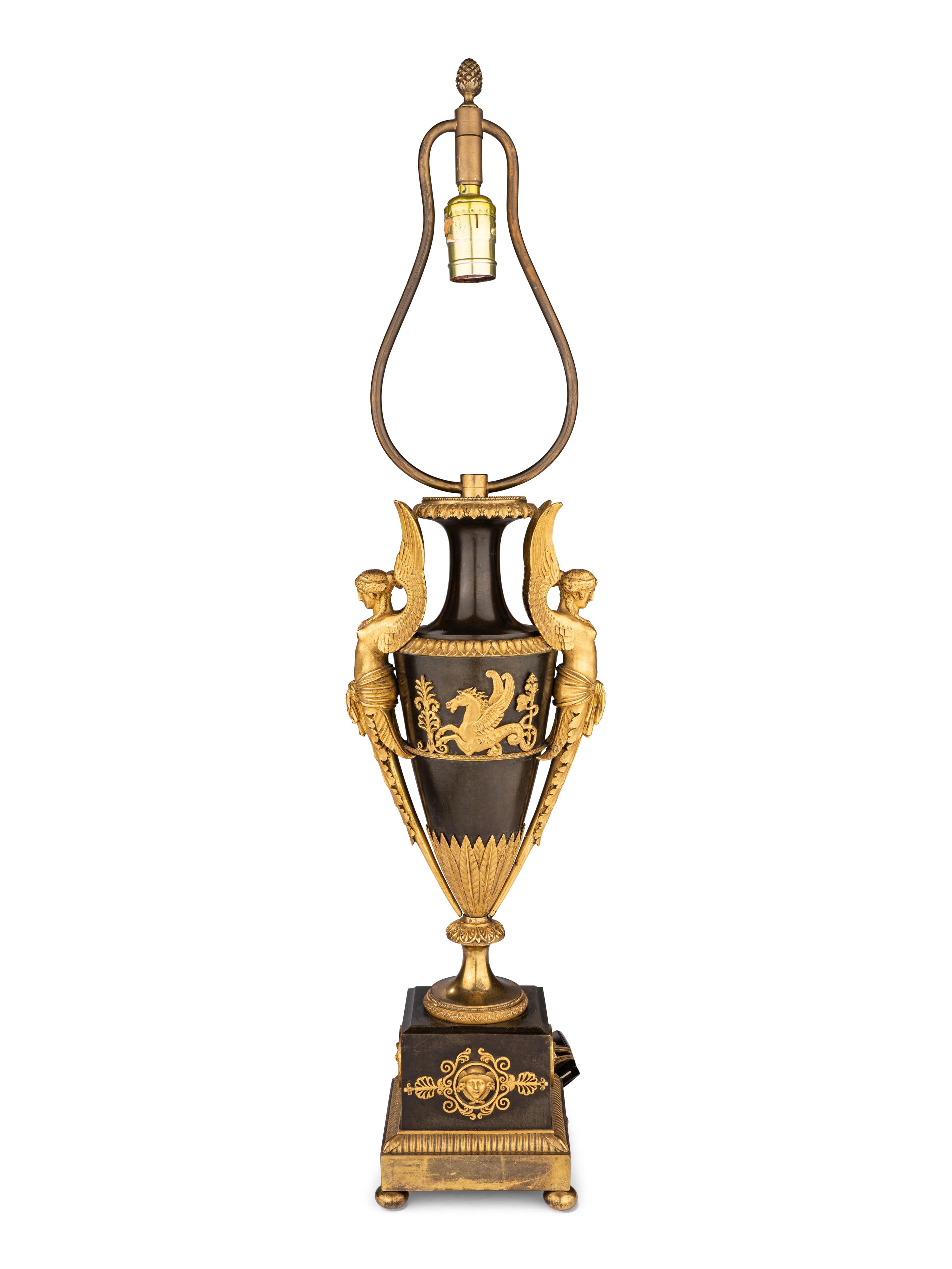 A Pair of Directoire Ormolu and Patinated Bronze Urns