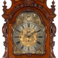 An English Carved Walnut Tall Case Clock