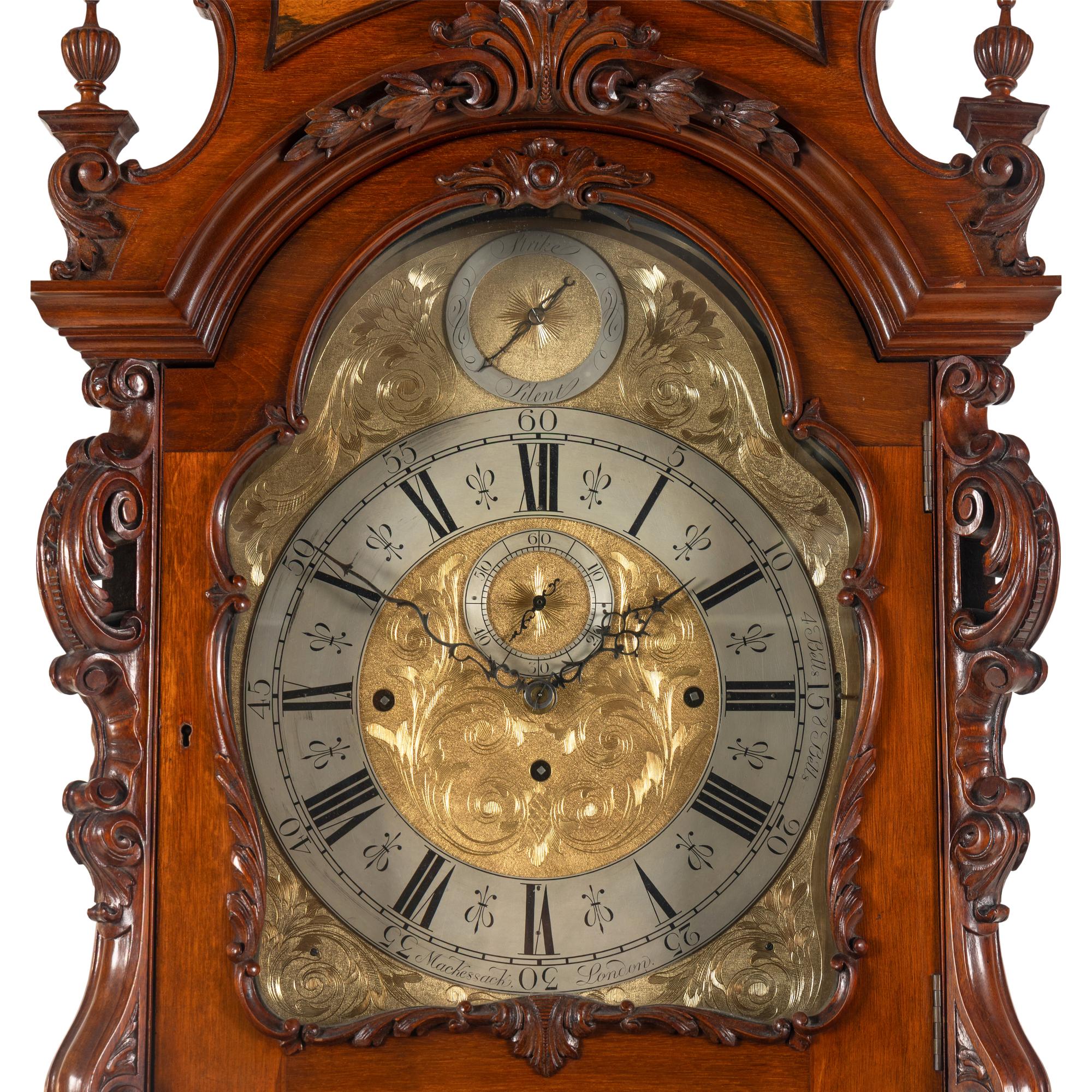 An English Carved Walnut Tall Case Clock
