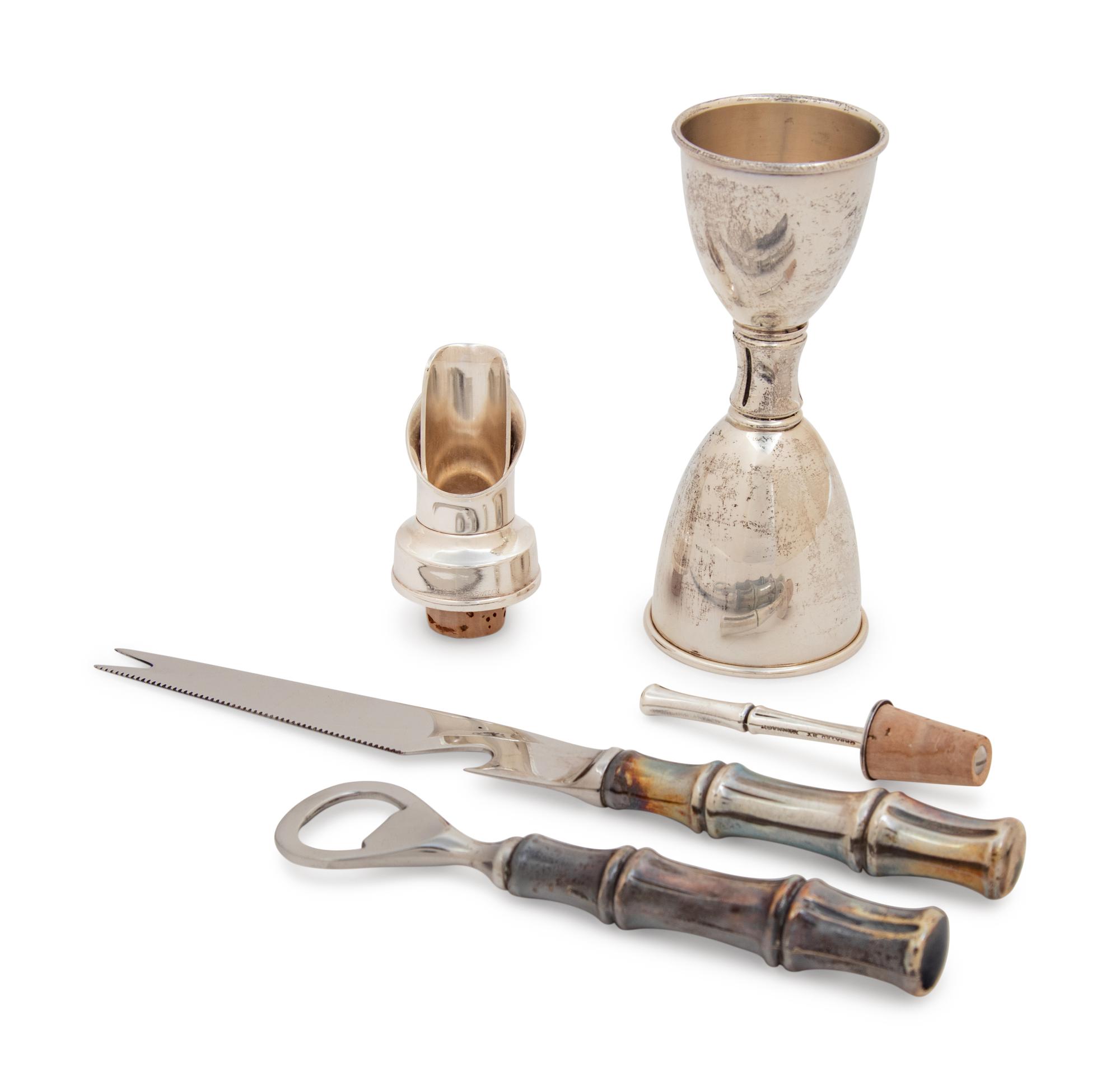 A Group of Four Tiffany & Co. Silver Bamboo Pattern Bar Articles