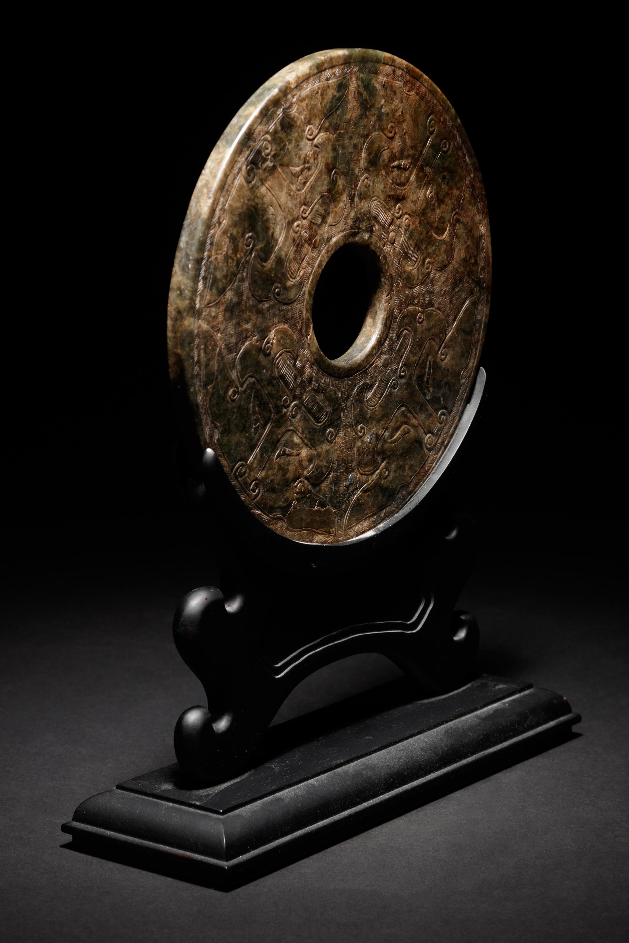 A Chinese Carved Nephrite Jade Bi Disc