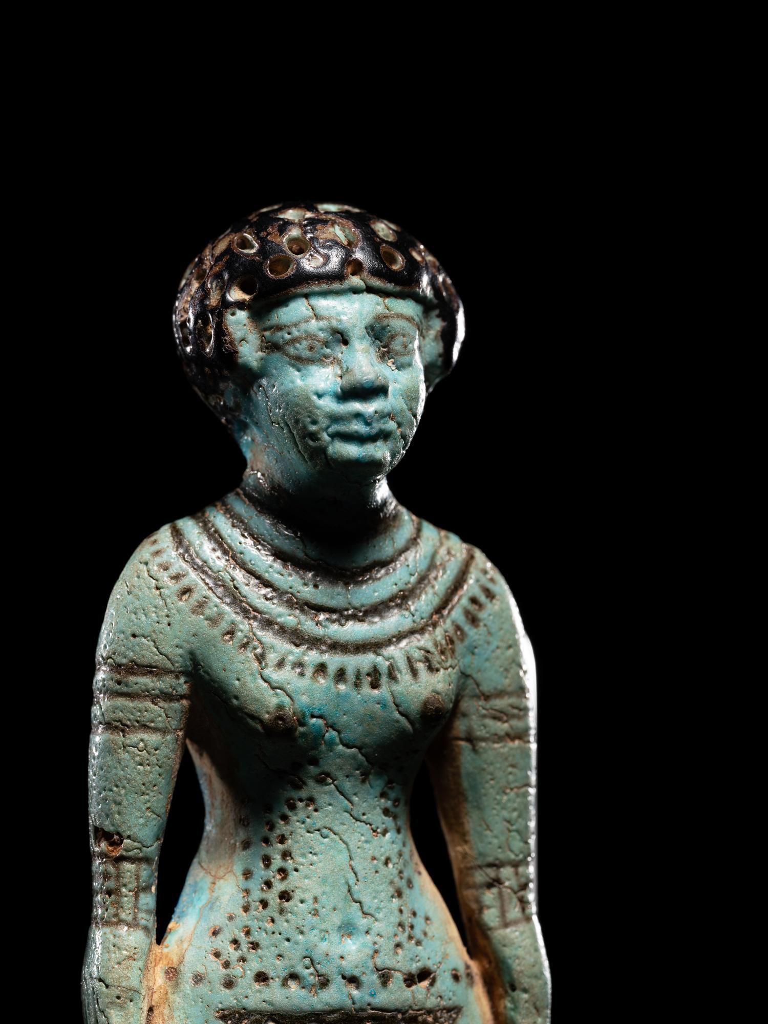 An Egyptian Faience Female Figure