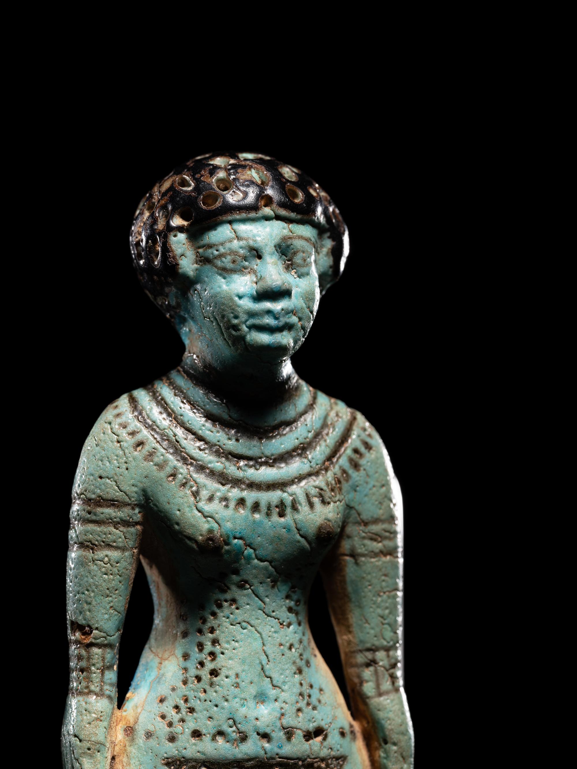 An Egyptian Faience Female Figure