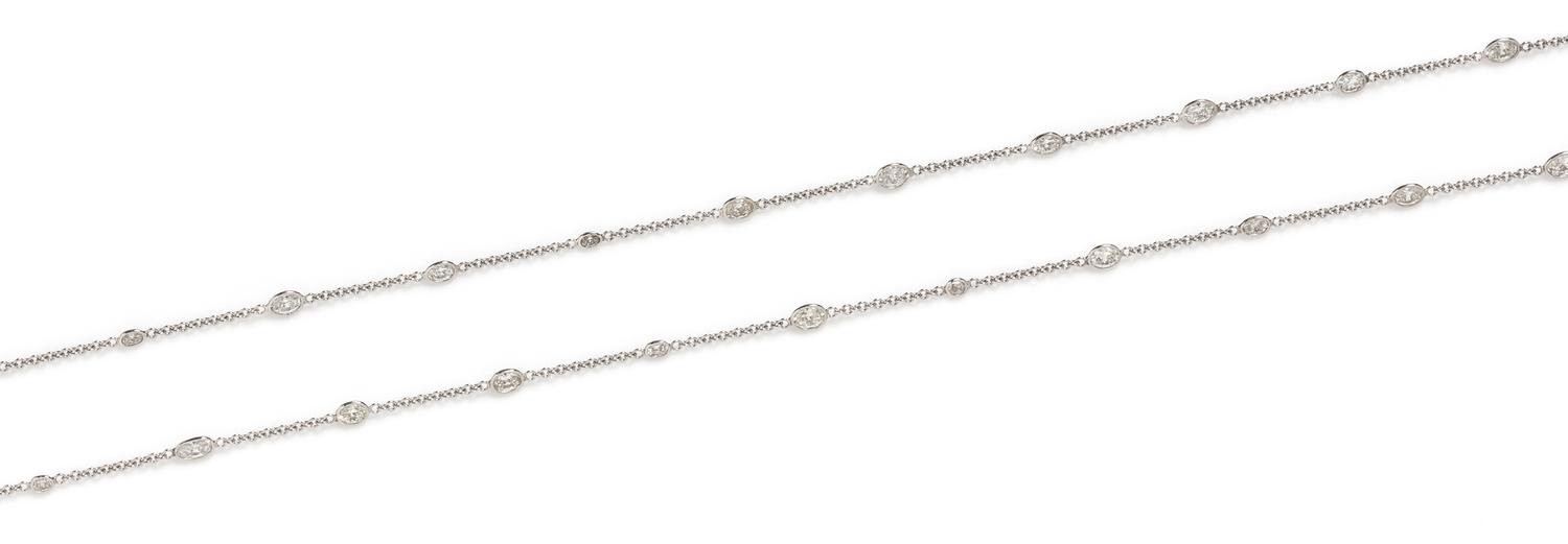 An 18 Karat White Gold and Diamond Station Necklace, 6.10 dwts.