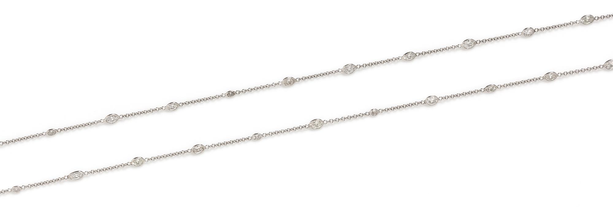 An 18 Karat White Gold and Diamond Station Necklace, 6.10 dwts.