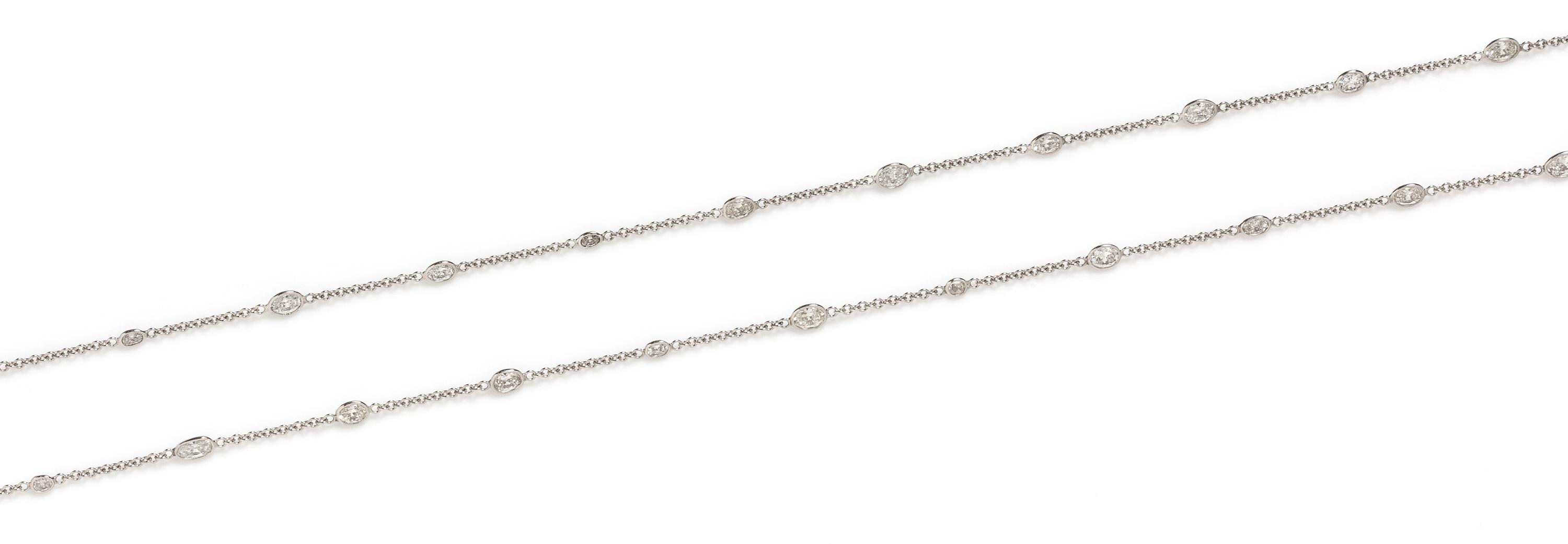 An 18 Karat White Gold and Diamond Station Necklace, 6.10 dwts.