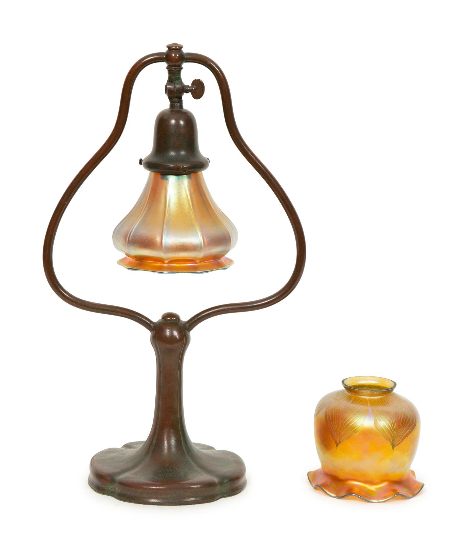 A Handel Bronze Desk Lamp and Two Steuben Aurene Glass Shades