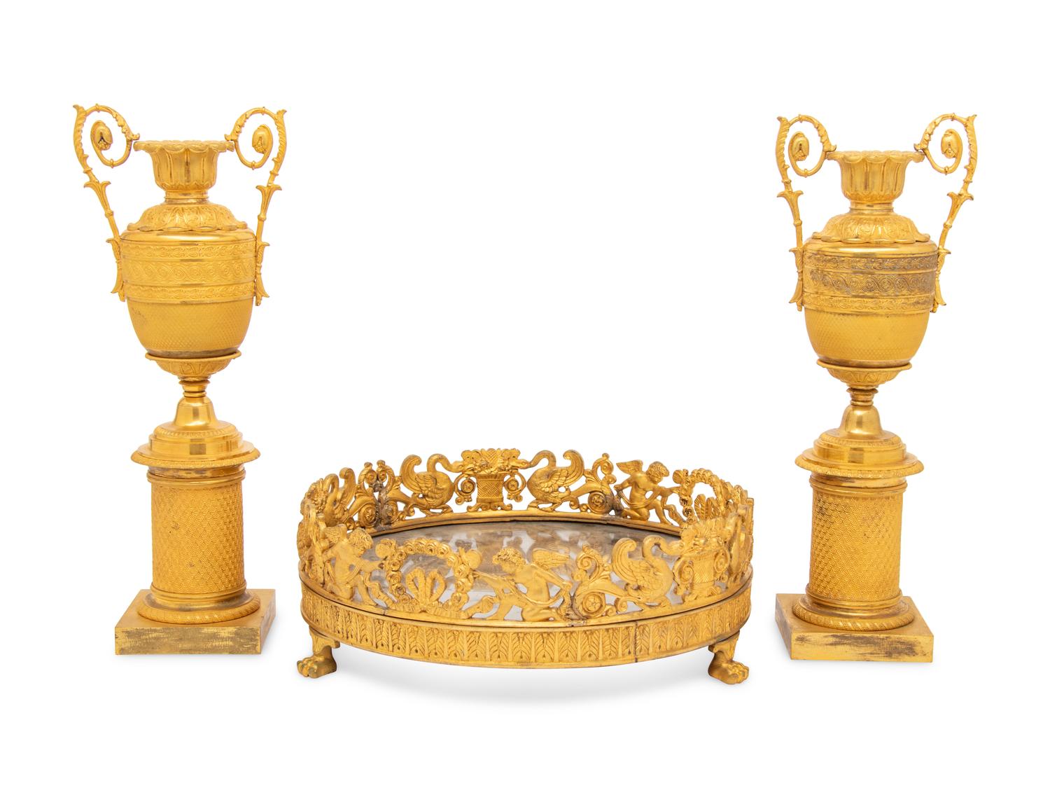 A Louis-Philippe Gilt Bronze Surtout de Table and a Pair of Restauration Gilt Bronze Urns