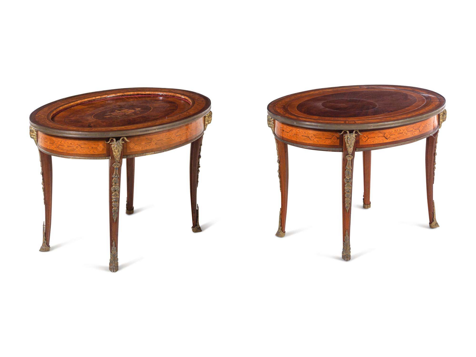 A Near Pair of Louis XV Style Gilt Bronze Mounted Marquetry Low Tables