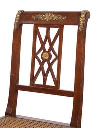 An Assembled Empire Style Gilt Metal Mounted Mahogany Dining Suite