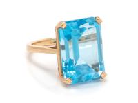 A 14 Karat Yellow Gold and Topaz Ring,