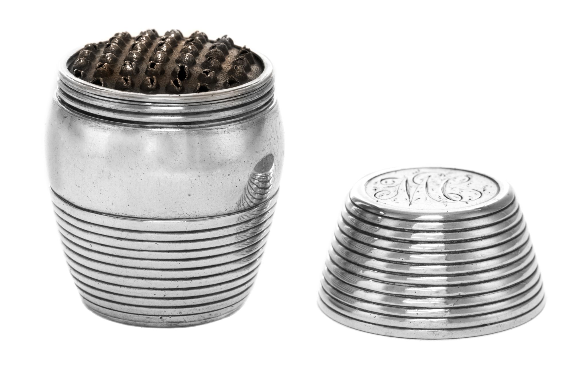 An American Silver Nutmeg Grater, Maker's Mark SM, of ribbed barrel form, one end having the engraved monogram MC.
