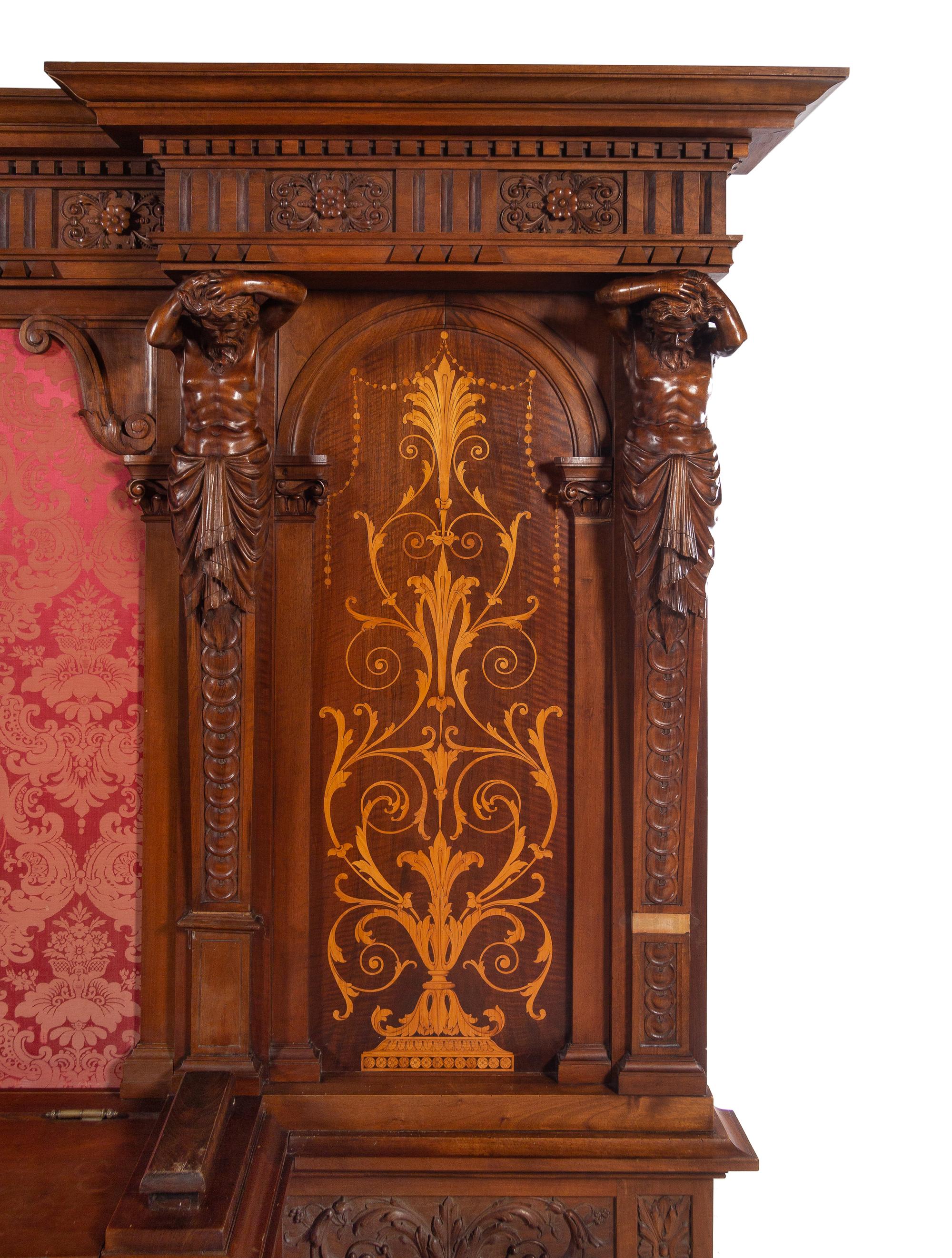 A Renaissance Revival Style Carved Walnut and Marquetry Hall Bench