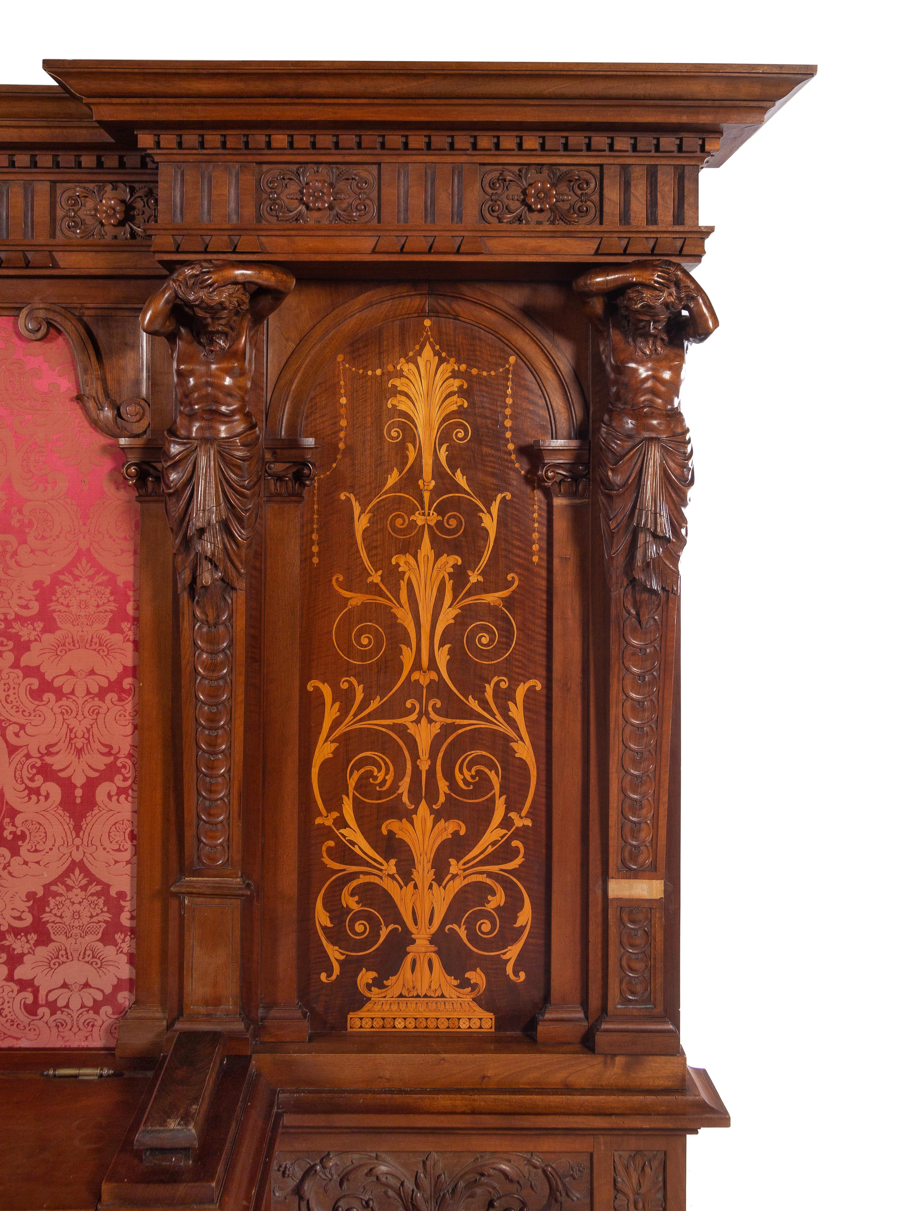 A Renaissance Revival Style Carved Walnut and Marquetry Hall Bench