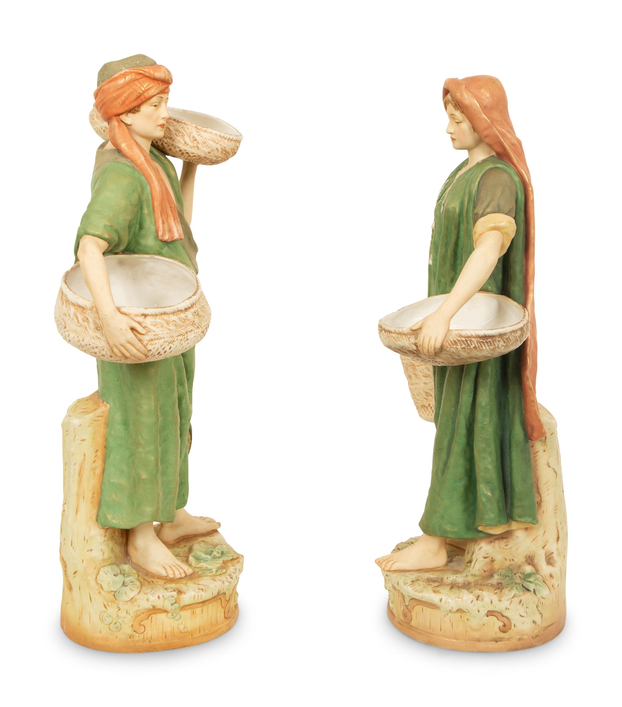 A Pair of Large Royal Dux Porcelain Water Carriers