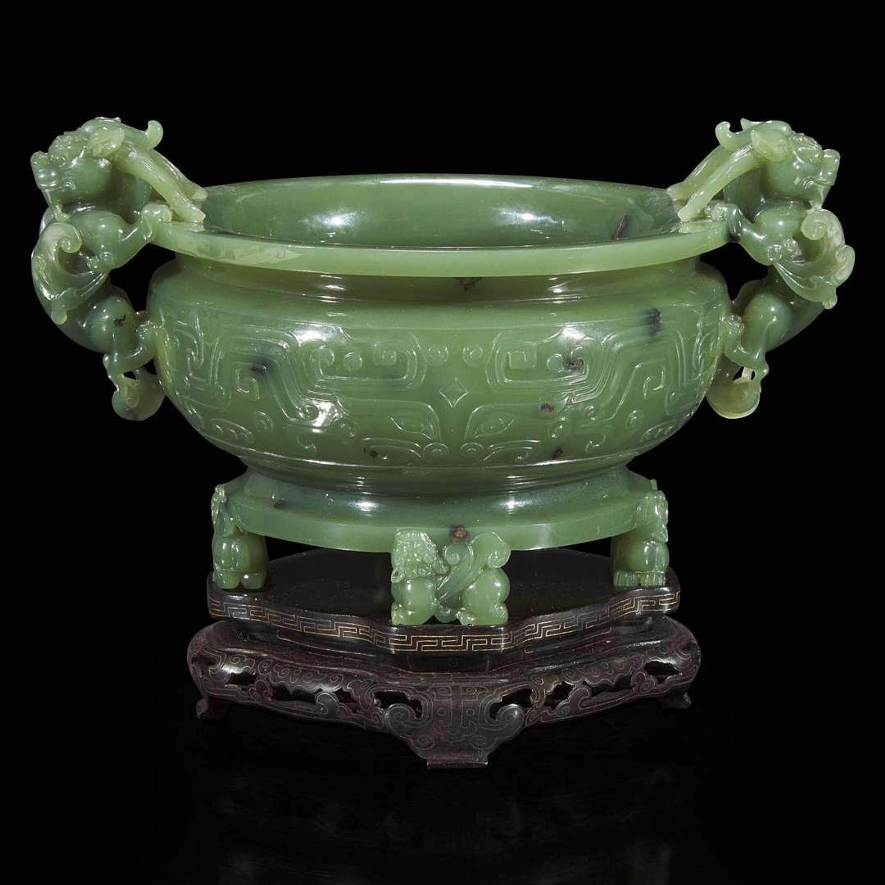 A Chinese carved sage green jade tripod censer 碧玉三足香炉
