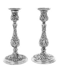A Pair of American Silver Candlesticks, S. Kirk & Son, Baltimore, MD, Repousse pattern, weighted.